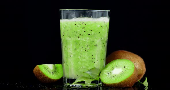 A Glass of Juice From Kiwi Rotates Slowly. 