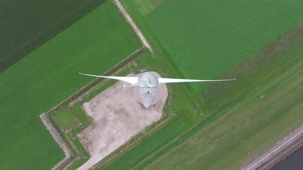 Bird's Eye Aerial View of a Giant Wind Turbine Used for Renewable Energy alt