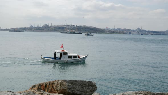 Small Boat Floating on River alt