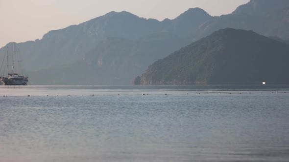 Sailing Ship in the Sea Bay on the Background alt
