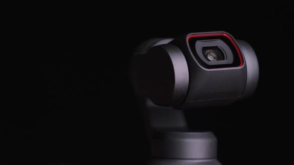 Mechanical Gimbal Camera Lens Rotates on Black Background Robotic Camera Macro alt
