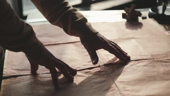 Men's Hands Move According To the Blueprints, Old Decrepit Documents alt