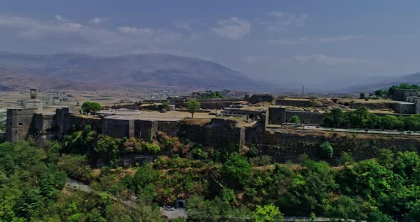 Aerial Drone View of Old Fortress and Clock Tower in Gjirokaster Albania alt