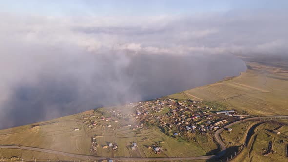 Aerial hyperlapse of Lake Paravani and the village Poka. Georgia 2021 alt
