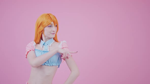 Portrait of Pretty Youth Pointing at Copy Space Looking at Ads Wearing Pastel Crop Top Medium alt