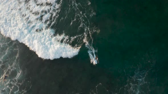 Sunrise on a Sandy Beach in the Southern Part of the Island of Sri Lanka. Surfers Ride on Their alt