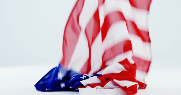 American flag falling on table alt