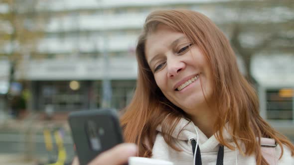 Beautiful Woman In The City Drinks Coffee alt