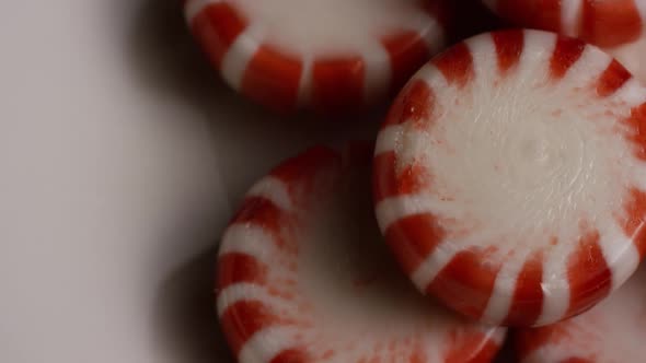 Rotating shot of peppermint candies - CANDY PEPPERMINT 054 alt