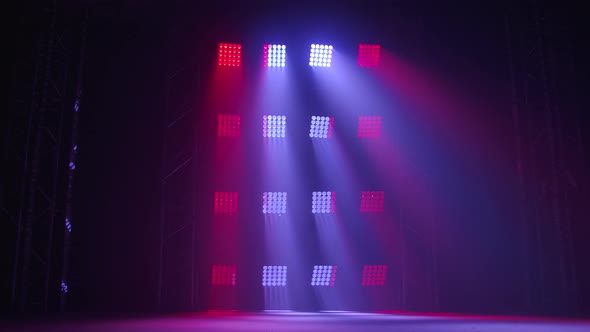 The Stage of a Small Theater with Red and Blue Spotlights. Lights Are Turned on From Darkness. alt