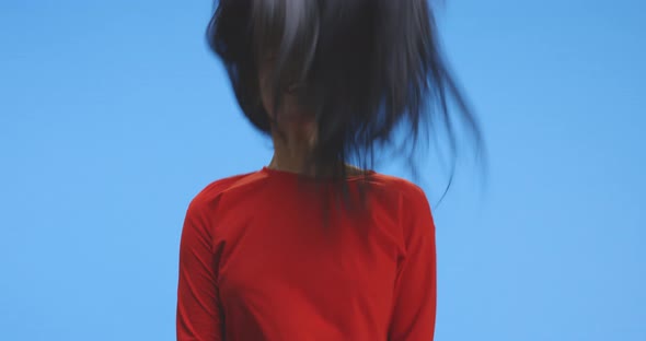 Young Woman Shaking Hair alt