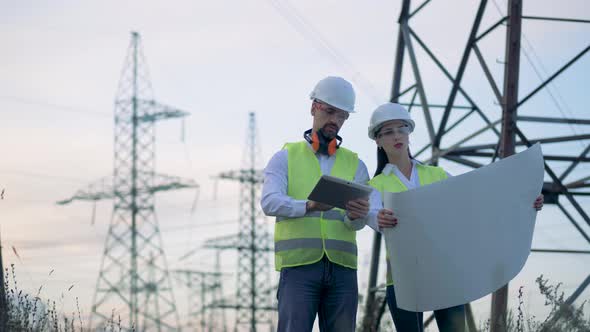 Working People at an Electricity Transmission Line, Close Up, Stock Footage