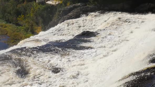 Revealing a Large Amount of Water Rushing Over A Big Waterfall in Quebec 2