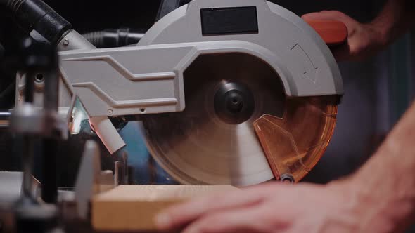 Slow Motion Process of Cutting a Wooden Board on Circular Saw