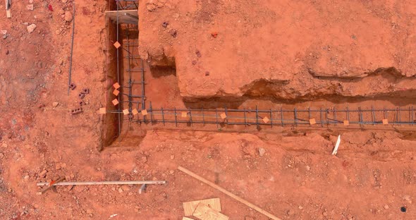 Putting Steel in a Trench for a House Foundation alt
