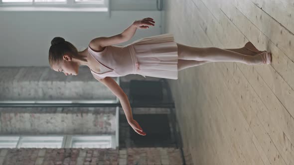 Beautiful 9-Year-Old Ballerina Standing On Her Toes alt