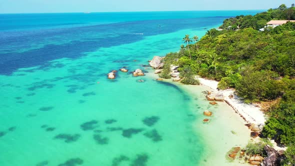 Aerial top down abstract of tropical resort beach vacation by blue water and white sand background o alt