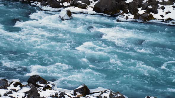 Waterfall with Pure Blue Water Slow Motion, Nature Landscape in Iceland alt