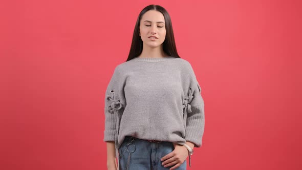 Frustrated Young Woman Tired of Life, Shooting Into Head with Finger Pistol alt