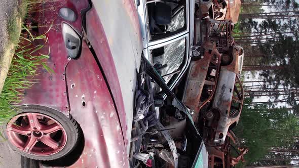 Vertical Video of Burned Cars During the War in Irpin Ukraine alt