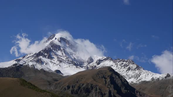 Mount Kazbek or Kazbegi is Covered with Snow