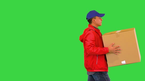 Delivery Man Carry Box to Client for Home Delivery Service Warehouse Worker or Loader with Parcel on