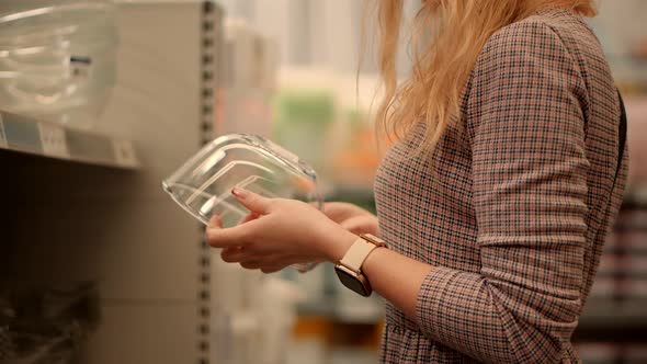 Customer In Store Market Buy Glass Fragile. Female Shopper In Hypermarket Check Items. alt