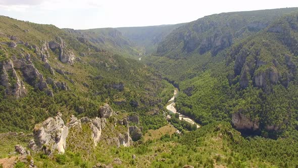 Aerial travel drone view of Gorges du Tarn and the Tarn River, Southern France. alt