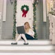 Happy Caucasian Girl Talking Remotely with Her Father on Christmas Day Near Her House - VideoHive Item for Sale