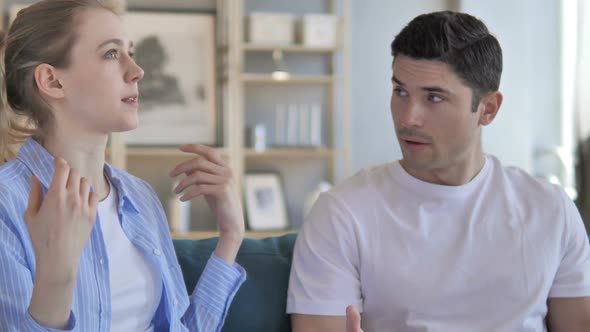 Angry Young Couple Fighting at Home alt