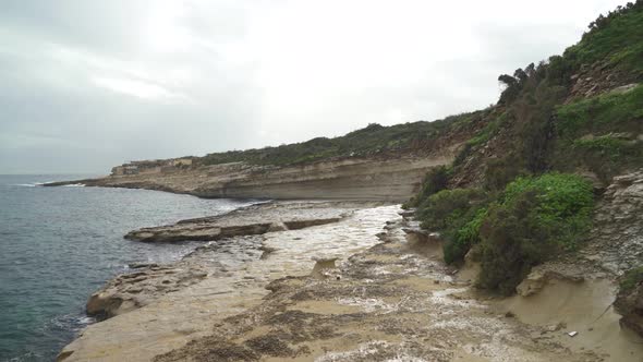 Cloudy Moody Day in Winter in Stone Beach Il-Kalanka in Malta