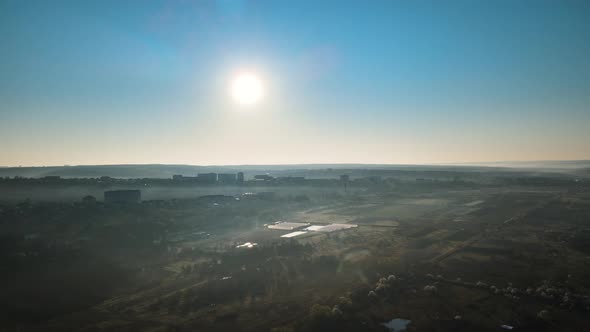 Aerial View of the Suburbs of the City at Sunrise in the Spring Morning alt