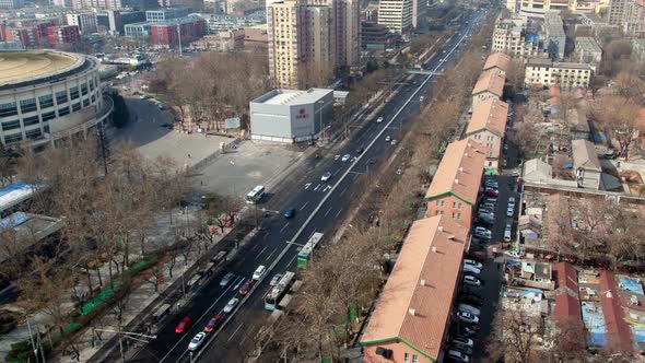 Beijing Business City Aerial Cityscape Panorama with Road Traffic China Timelapse Pan Up alt