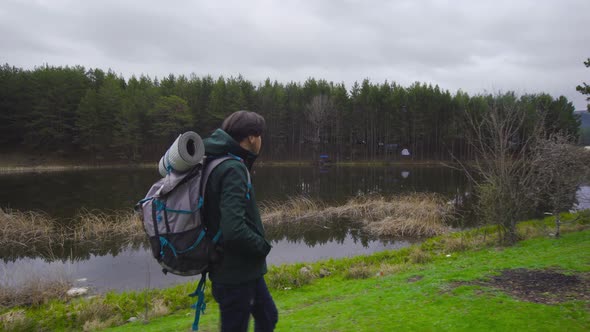 Young man hiking. alt