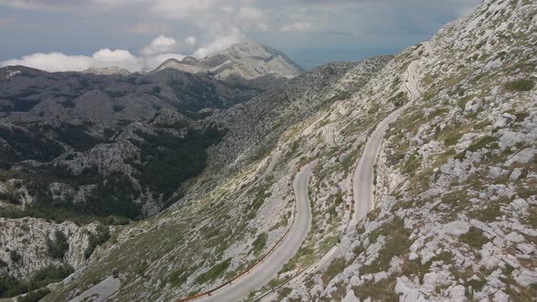 Dangerous Alpine Road Against the Backdrop of a Fantastically Beautiful Landscape in the Biokovo