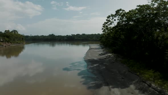 Fly Over Shallow River With Sandbank In The Jungle Of Ecuador Amazon. Aerial Drone Shot alt