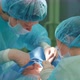 Surgeon Woman Performs Surgery on Patient - VideoHive Item for Sale