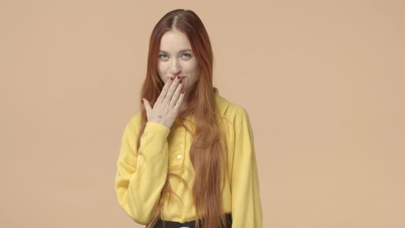 Lovely Sensual Attractive Redhead Woman with Long Natural Ginger Hair Tattooed Hand Kissing Palm and alt