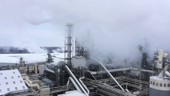 Smoke From the Pipes of an Industrial Plant Pollutes the Atmosphere