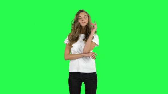 Lovable Girl Posing at the Camera. Green Screen alt