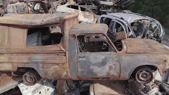 Consequences of the War in Ukraine  Destroyed Cars in Irpin Bucha District alt