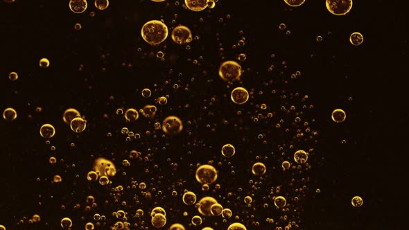 Super Slow Motion Shot of Moving Oil Bubbles Isolated on Black Background at 1000Fps alt
