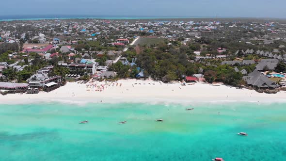 Aerial Paradise Sandy Beach with Turquoise Ocean and Luxury Hotels in Zanzibar alt