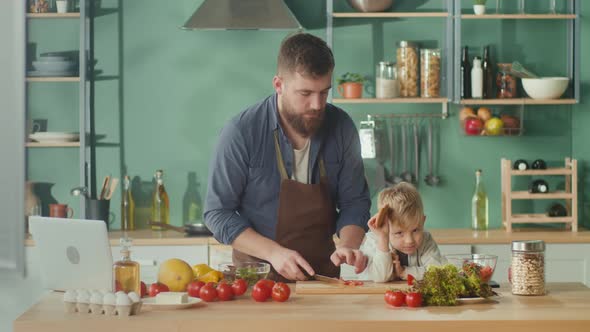 A Cheerful Father and Son Spending Time Together alt