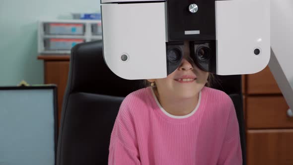 Close Up of a Little Girl an Eyes Test in Before the New School Year alt