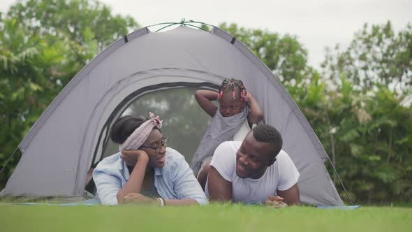 Cheerful african american family enjoying in the park, Happiness family concepts