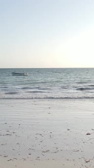 Boat Boats in the Ocean Near the Coast of Zanzibar Tanzania Slow Motion Vertical Video alt