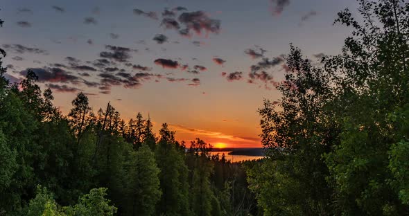 Beautiful Evening Sunset Landscape with a Span of Time Forest and River in the Distance alt