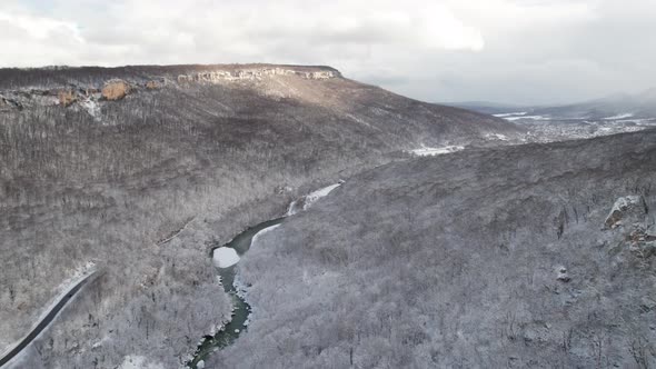 Aerial View of Plateau LagoNaki Mountain Twisted Road in the Winter and Driving Car alt