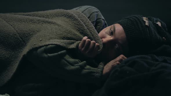 Crying Refugee Taking Cover, Missing Home and Looking for Shelter, Poverty alt